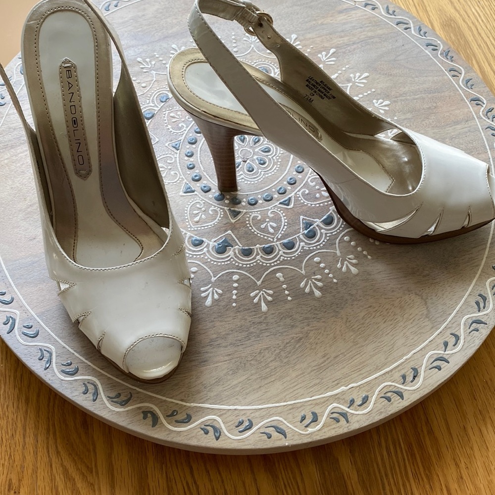 White patent Bandolino sandals.